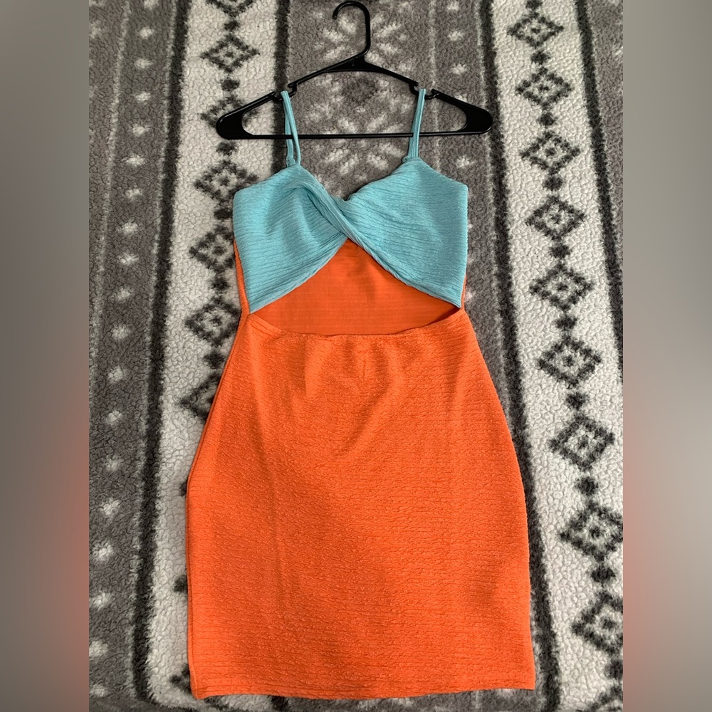 Selling a summer/party dress. From Shein, size is small. Never has been worn.